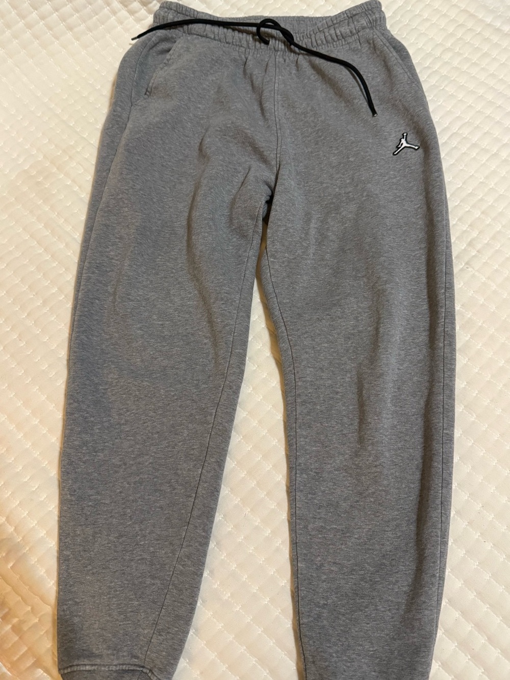 Nike Jordan Gray Jogger Sweatpants with Black Drawstring and Iconic Jordan logo